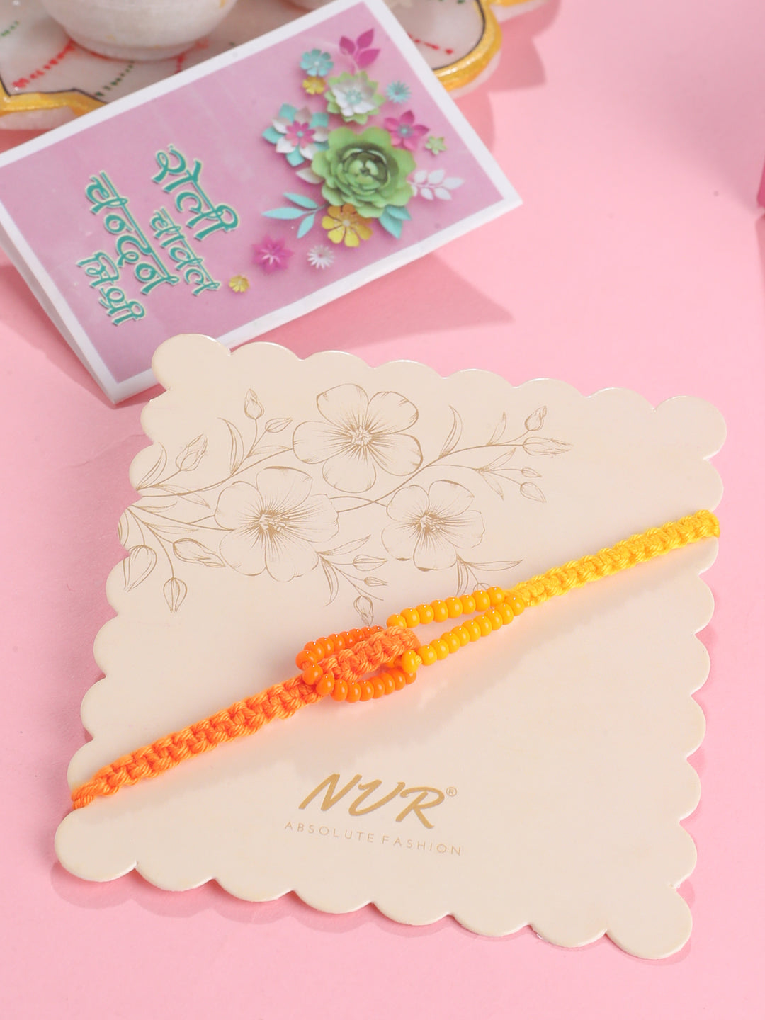 NVR Men's Multicolor Pearls Thread Rakhi with Roli Chawal Chandan & Mishri - Swadesiicart