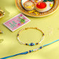 NVR Set of 2 Blue Evil Eye Artificial Stones & Beads Bhaiya Bhabhi Rakhi with Roli Chawal Chandan & Mishri | Swadesiicart
