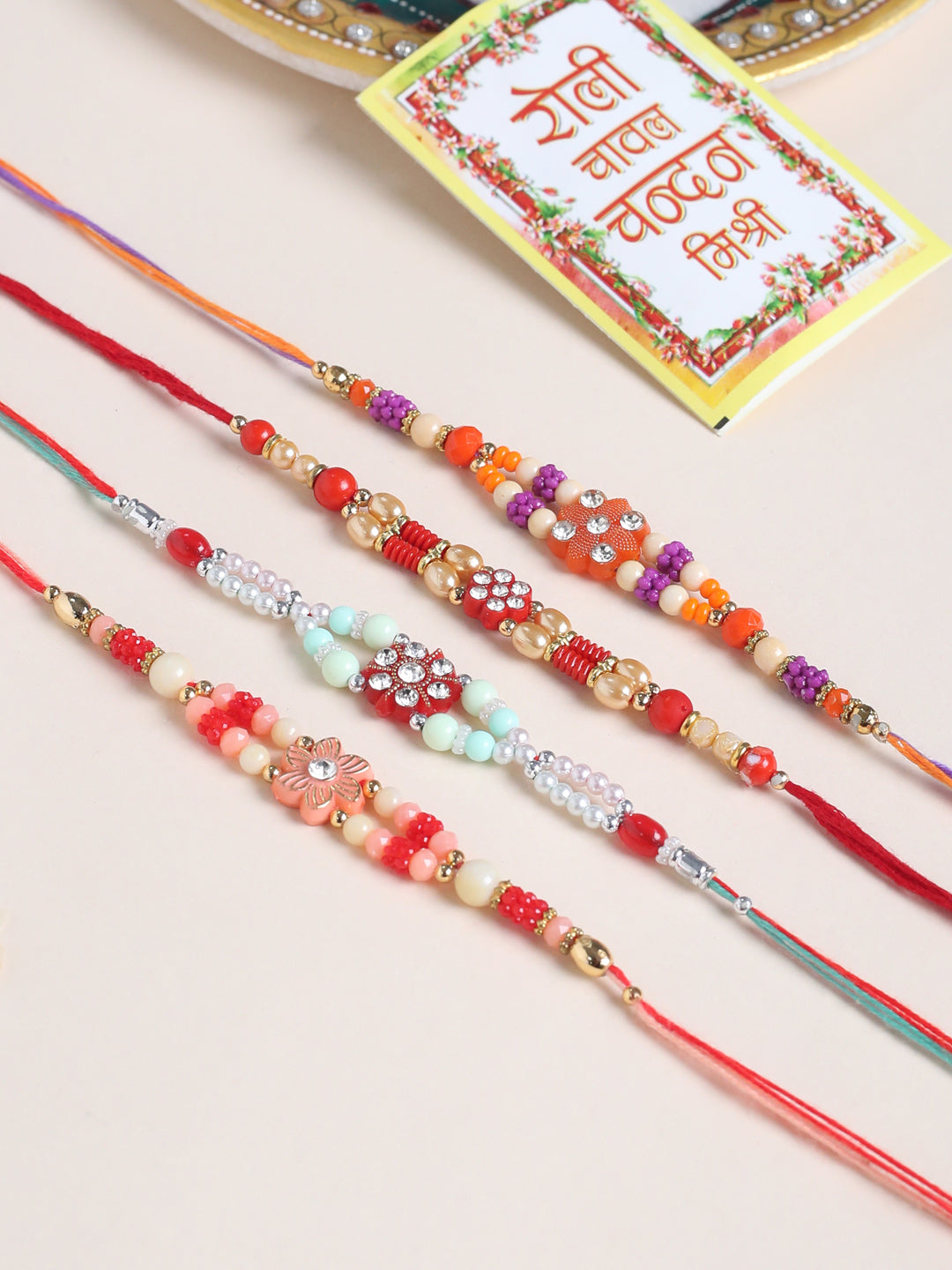 NVR Men Set of 4 Floral Design Multicolor Artificial Stones and Beads Thread Rakhi with Roli Chawal Chandan & Mishri - Swadesiicart
