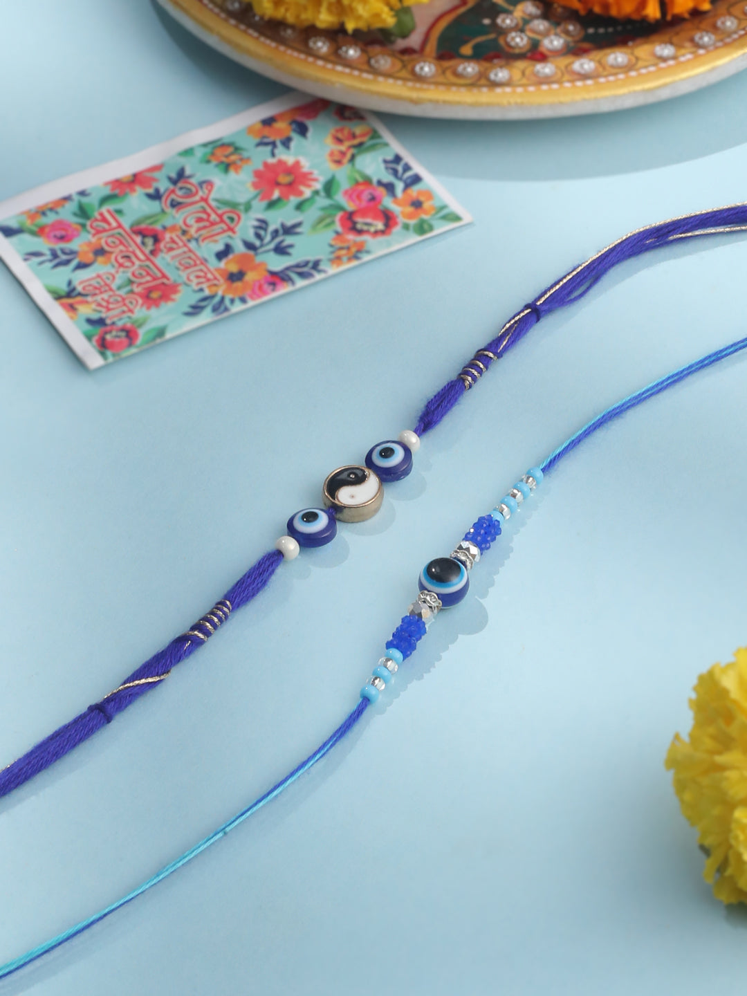 NVR Men Set of 2 Blue Evil Eye Artificial Beads Thread Rakhi with Roli Chawal Chandan & Mishri - Swadesiicart