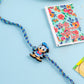 NVR Stylish Blue Cartoon Character Kids Rakhi with Roli Chawal Chandan & Mishri - Swadesiicart