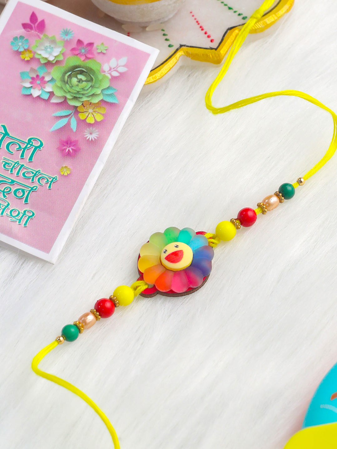 NVR Kids Multicolor Artificial Beads Rakhi with Roli Chawal Chandan & Mishri | Swadesiicart