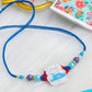 NVR Kids Teddy Blue Artificial Beads Thread Rakhi with Roli Chawal Chandan & Mishri - Swadesiicart