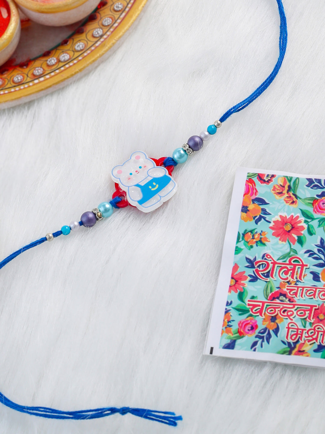 NVR Kids Teddy Blue Artificial Beads Thread Rakhi with Roli Chawal Chandan & Mishri - Swadesiicart