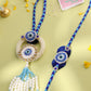 NVR Set of 2 Blue Evil Eye Artificial Stones & Pearls Bhaiya Bhabhi Rakhi with Roli Chawal Chandan & Mishri | Swadesiicart