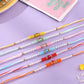 NVR Men Set of 6 Multicolor Artificial Stones & Pearls Rakhi with Roli Chawal Chandan & Mishri | Swadesiicart