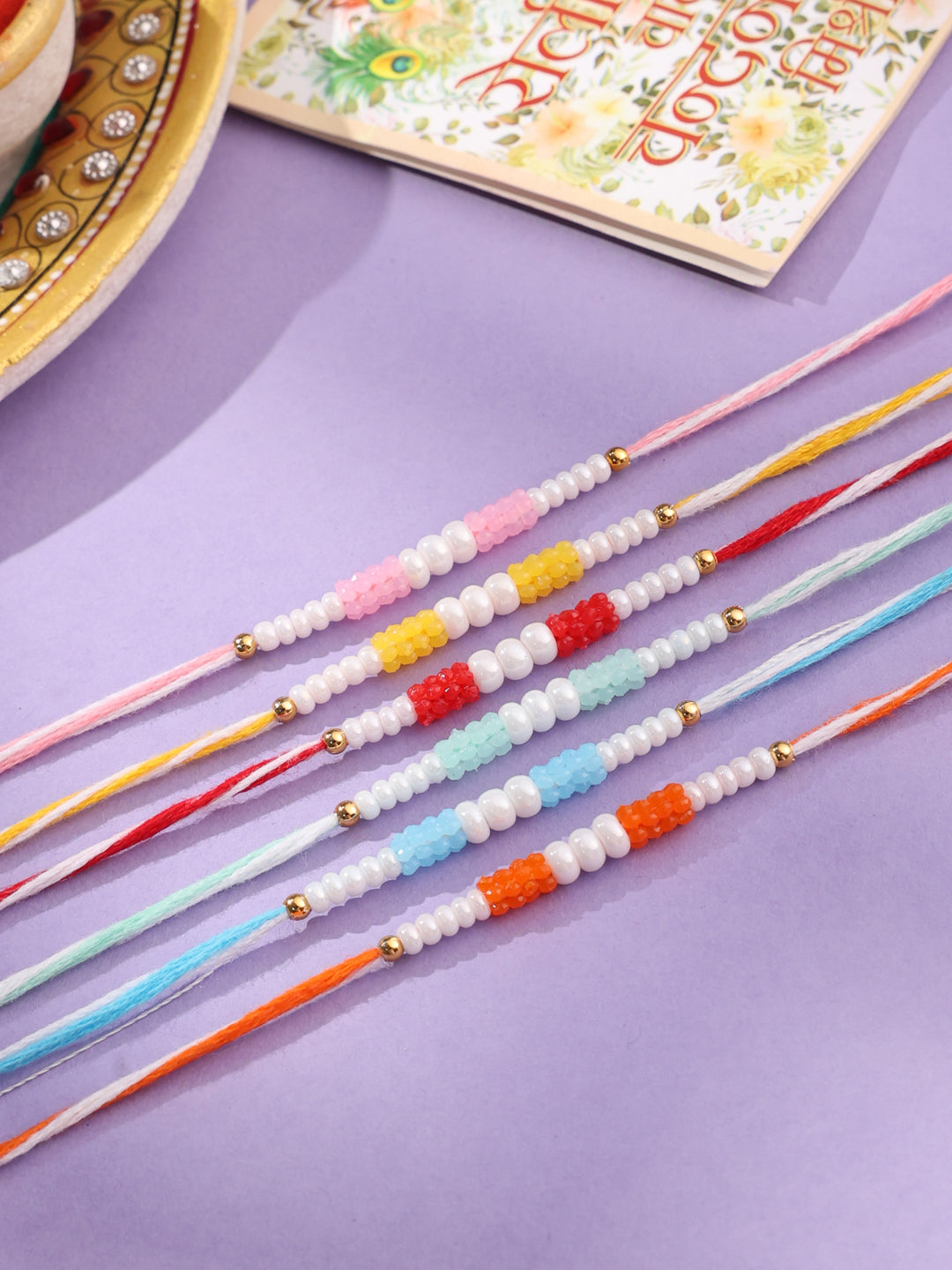 NVR Men Set of 6 Multicolor Pearls Thread Rakhi with Roli Chawal Chandan & Mishri | Swadesiicart