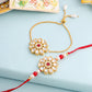 NVR Set of 2 Gold Toned Kundan Studded Floral Design Bhaiya Bhabhi Rakhi Set with Roli Chawal Chandan & Mishri | Swadesiicart