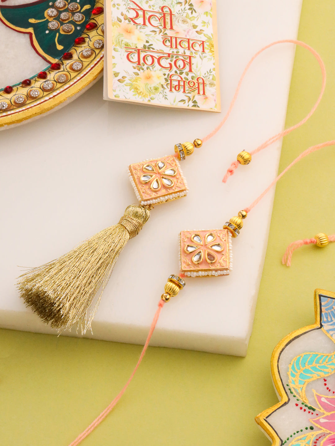 NVR Set of 2 Handmade Peach Kundan Studded Bhaiya Bhabhi Rakhi Set with Roli Chawal Chandan & Mishri - Swadesiicart