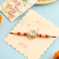 NVR Men Red Kundan Studded Floral Design Thread Rakhi with Roli Chawal Chandan & Mishri - Swadesiicart