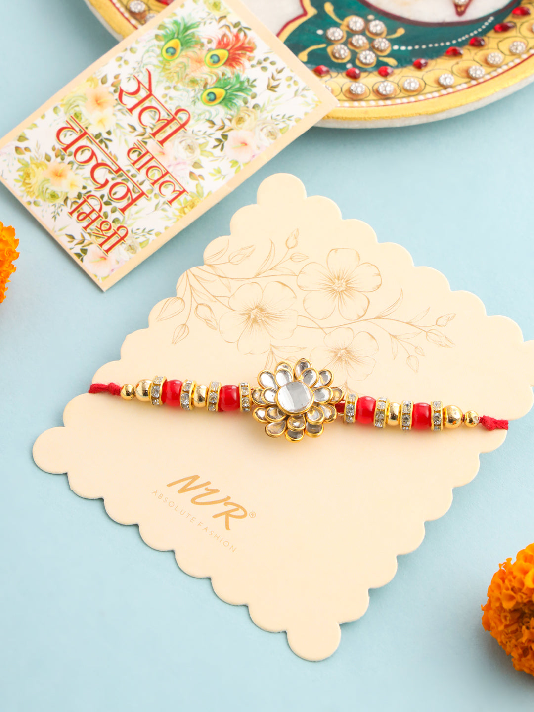 NVR Men Red Kundan Studded Floral Design Thread Rakhi with Roli Chawal Chandan & Mishri - Swadesiicart