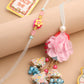 NVR Set of 2 Multicolor Artificial Beads Floral Design Bhaiya Bhabhi Rakhi with Roli Chawal Chandan & Mishri - Swadesiicart