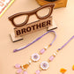 NVR Set of 2 Purple Artificial Stones & Beads Floral Design Thread Bhaiya Bhabhi Rakhi Combo | Swadesiicart