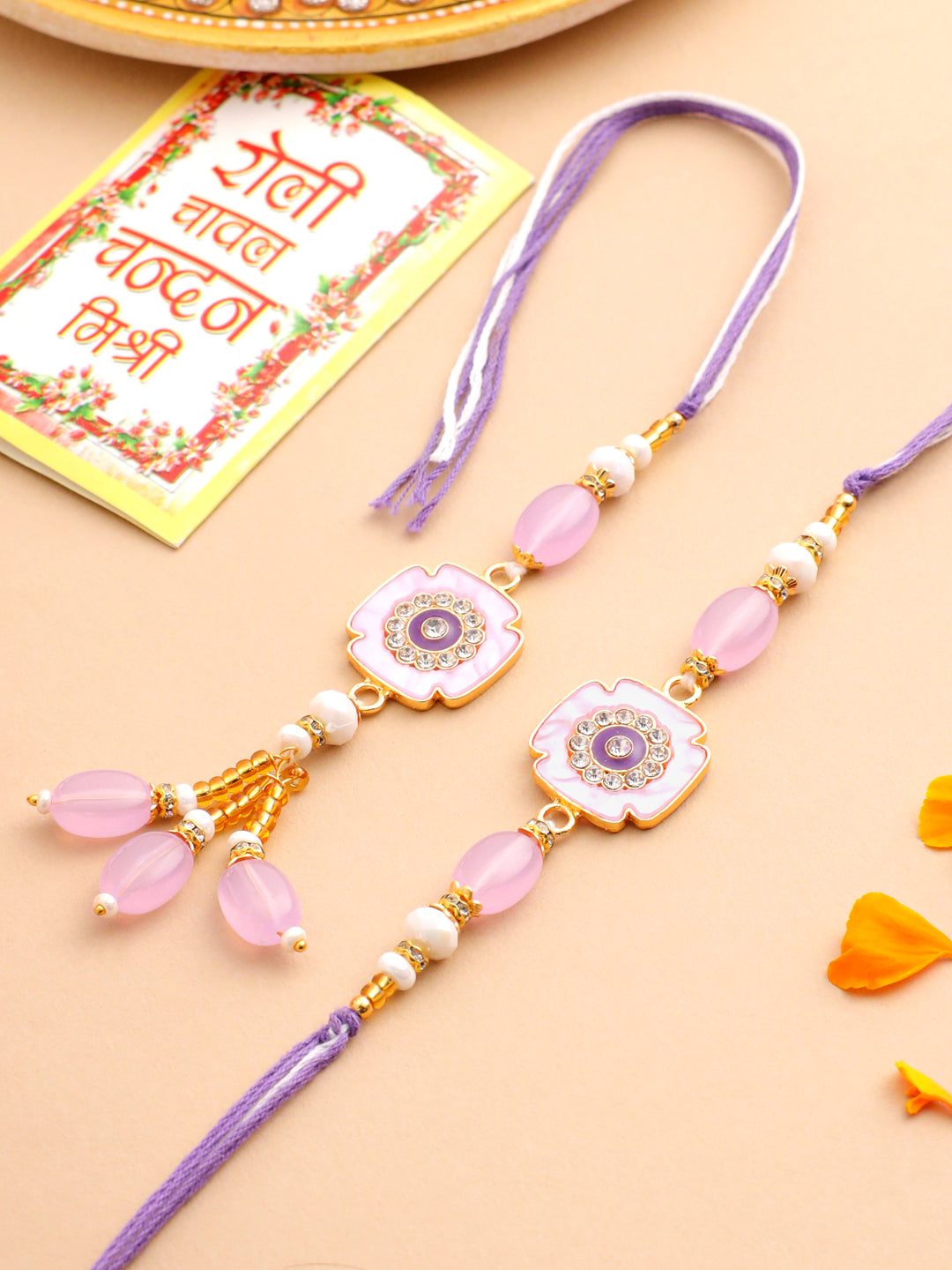 NVR Set of 2 Purple Artificial Stones & Beads Floral Design Thread Bhaiya Bhabhi Rakhi with Roli Chawal Chandan & Mishri | Swadesiicart