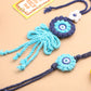 NVR Set of 2 Blue Evil Eye Floral Bhaiya Bhabhi Rakhi With Roli Chawal Chandan & Mishri | Swadesiicart