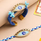 NVR Set of 2 Blue Evil Eye & Kundan Studded Handcrafted Bhaiya Bhabhi Rakhi with Roli Chawal Chandan & Mishri | Swadesiicart