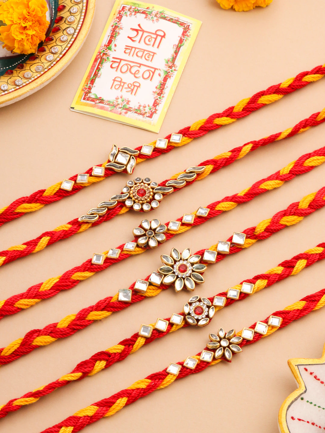 NVR Men Set of 6 Red & Yellow Kundan Studded Floral Design Thread Rakhi with Roli Chawal Chandan & Mishri | Swadesiicart