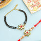 NVR Set of 2 Gold Toned Kundan Studded Floral Shape Bhaiya Bhabhi Rakhi with Roli Chawal Chandan & Mishri - Swadesiicart