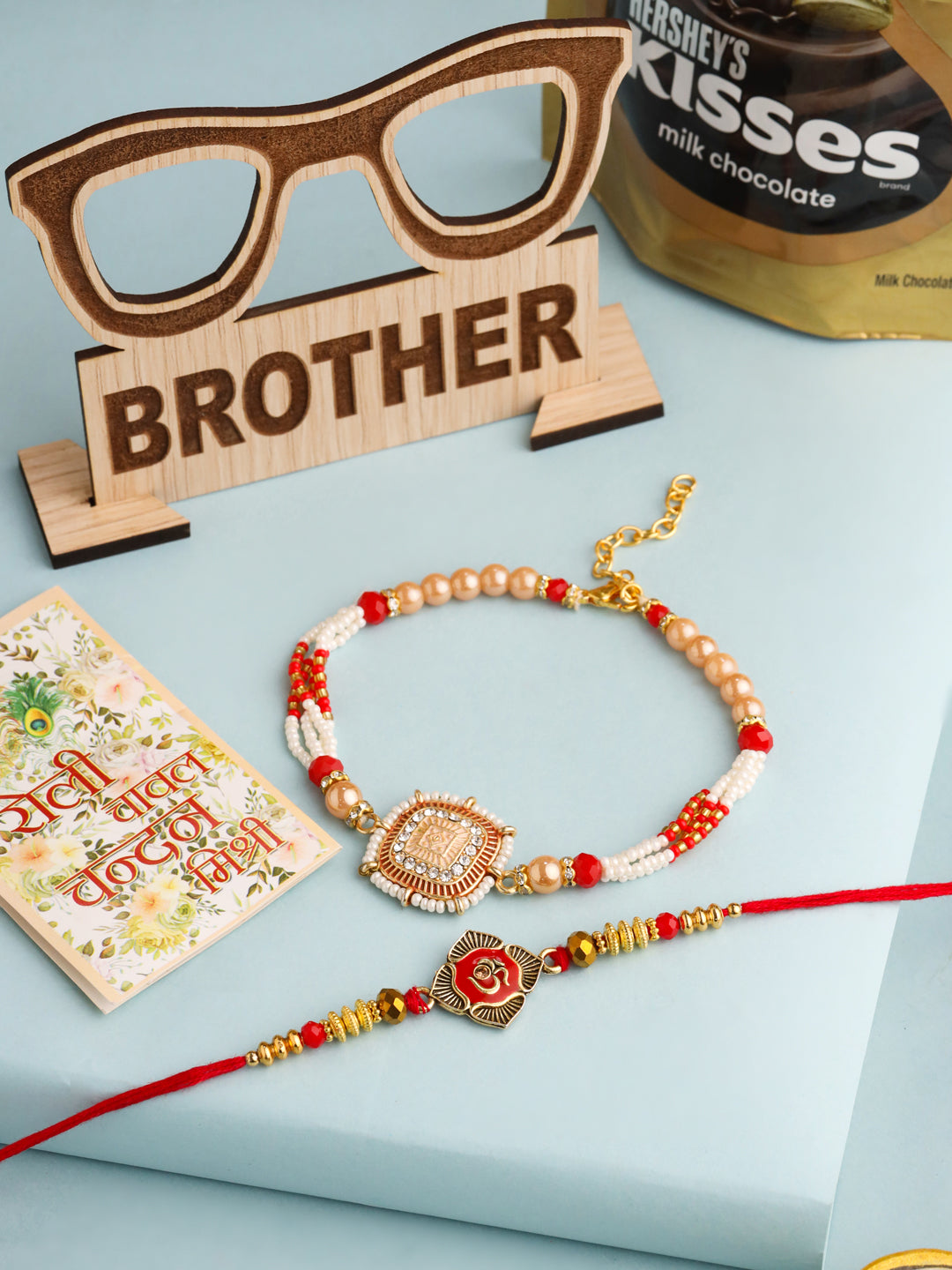 NVR Set of 2 Gold Toned Artificial Stones & Beads Om Design Bhaiya Bhabhi Rakhi Combo | Swadesiicart