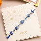 NVR Men's Blue Evil Eye Thread Rakhi with Roli Chawal Chandan & Mishri - Swadesiicart