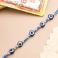 NVR Men's Blue Evil Eye Thread Rakhi with Roli Chawal Chandan & Mishri - Swadesiicart