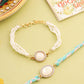 NVR Set of 2 White Pearls & Artificial Beads Bhaiya Bhabhi Rakhi with Roli Chawal Chandan & Mishri - Swadesiicart