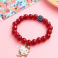 NVR Kids Cartoon Design Maroon Artificial Beads Thread Rakhi with Roli Chawal Chandan & Mishri | Swadesiicart