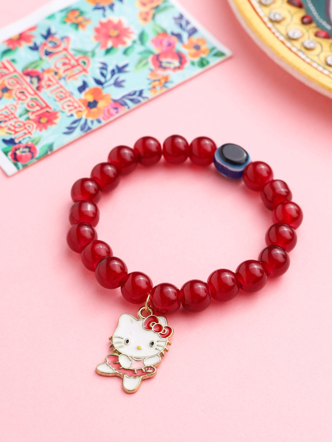 NVR Kids Cartoon Design Maroon Artificial Beads Thread Rakhi with Roli Chawal Chandan & Mishri | Swadesiicart