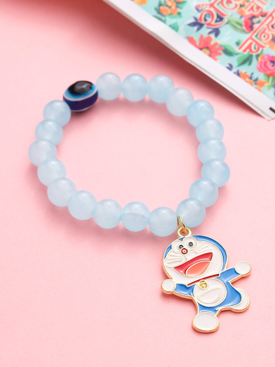 NVR Kids Cartoon Design Sky BLue Artificial Beads Thread Rakhi with Roli Chawal Chandan & Mishri | Swadesiicart