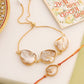 NVR Set of 2 Gold Toned Pearls Bhaiya Bhabhi Rakhi with Roli Chawal Chandan & Mishri - Swadesiicart