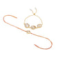 NVR Set of 2 Gold Toned Pearls Bhaiya Bhabhi Rakhi with Roli Chawal Chandan & Mishri - Swadesiicart