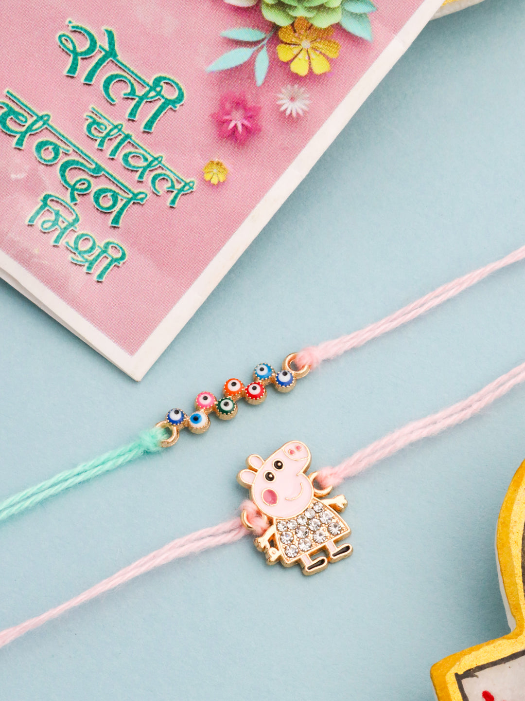 NVR Kids Set of 2 Cartoon Artificial Stones Thread Rakhi with Roli Chawal Chandan & Mishri | Swadesiicart
