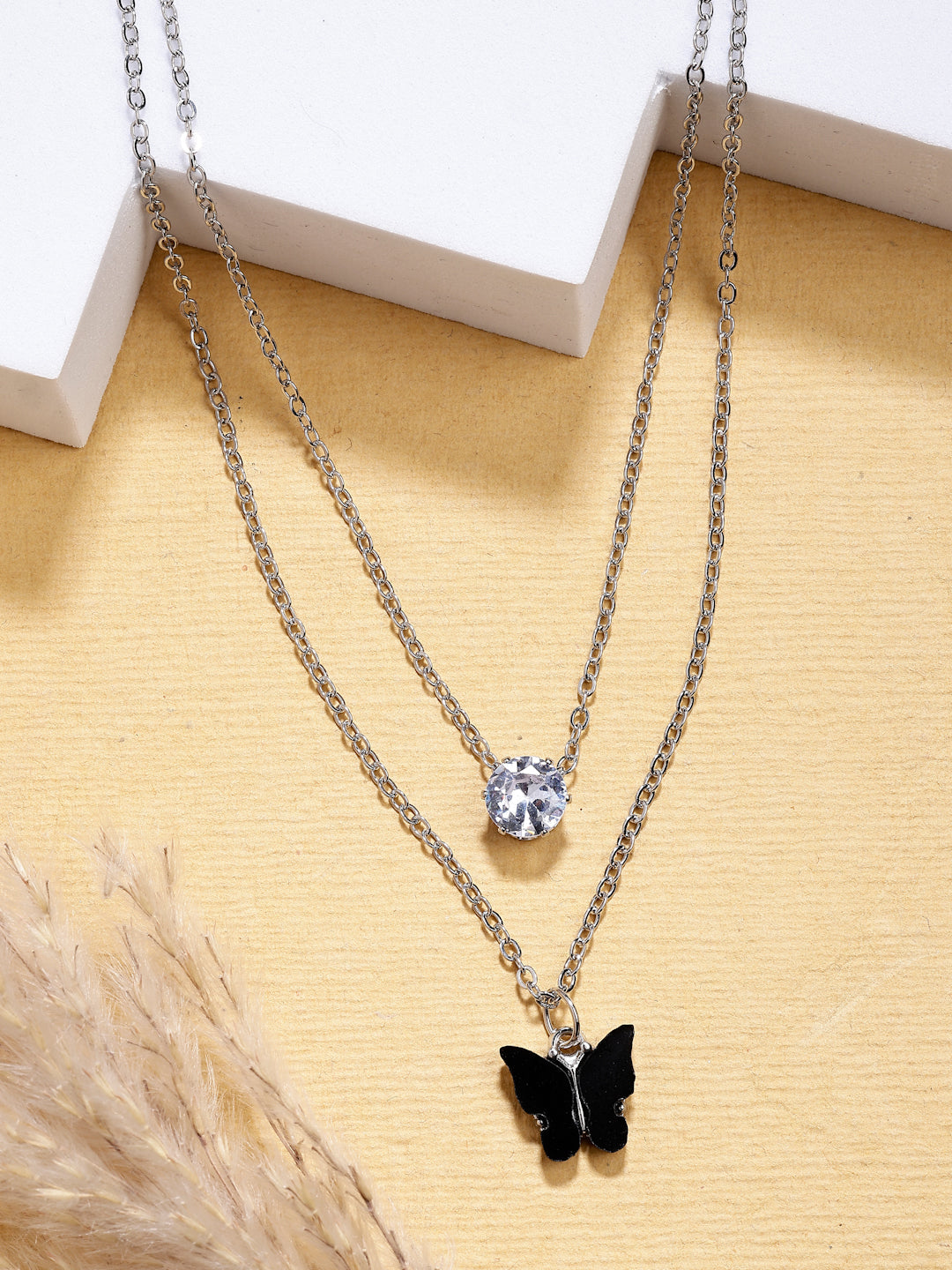 NVR Women's Silver-Toned Artificial Stones Butterfly-shaped Layered Chain | Swadesiicart