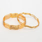NVR Women's Set of 4 Gold-Polished Cubic Zirconia Stone Studded Bangles - Swadesiicart