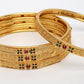 NVR Women's Set of 4 Gold-Polished Artificial Stones Traditional Bangles - Swadesiicart