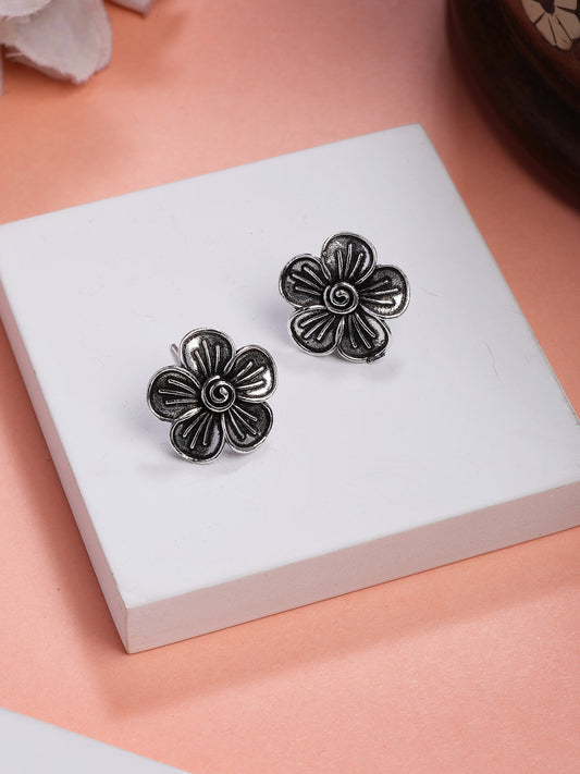 NVR Women Silver Plated Oxidized Floral Shape Stud Earrings - Swadesiicart