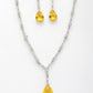 NVR Women's Silver-Plated Yellow American Diamond-Studded Handcrafted Jewellery Set - Swadesiicart
