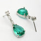 NVR Women's Silver-Plated Green American Diamond-Studded Handcrafted Jewellery Set - Swadesiicart