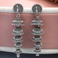NVR Women Silver Plated Oxidized Peacock Design Layered Jhumka Earrings - Swadesiicart