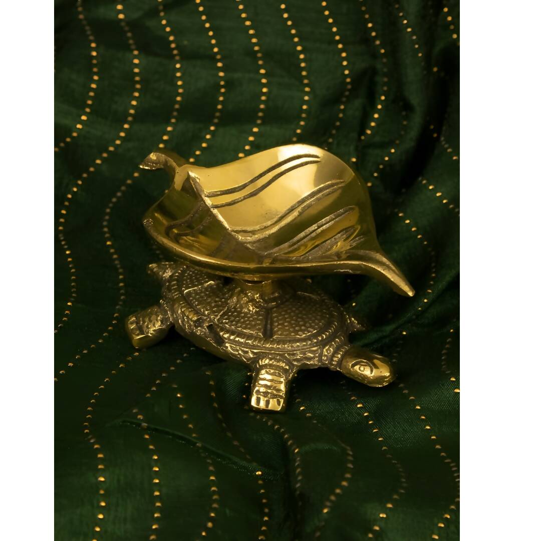 Spillbox Gold Toned Tortoise Leaf Diya | Swadesiicart