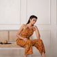 Juniper Mustard Printed Abstract Viscose Jumpsuit With Belt - Swadesiicart