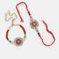 NVR Women & Men Set of 2 Red-colored Stone-Studded & Beaded Bhaiya Bhabhi Rakhi With Roli Chawal | Swadesiicart