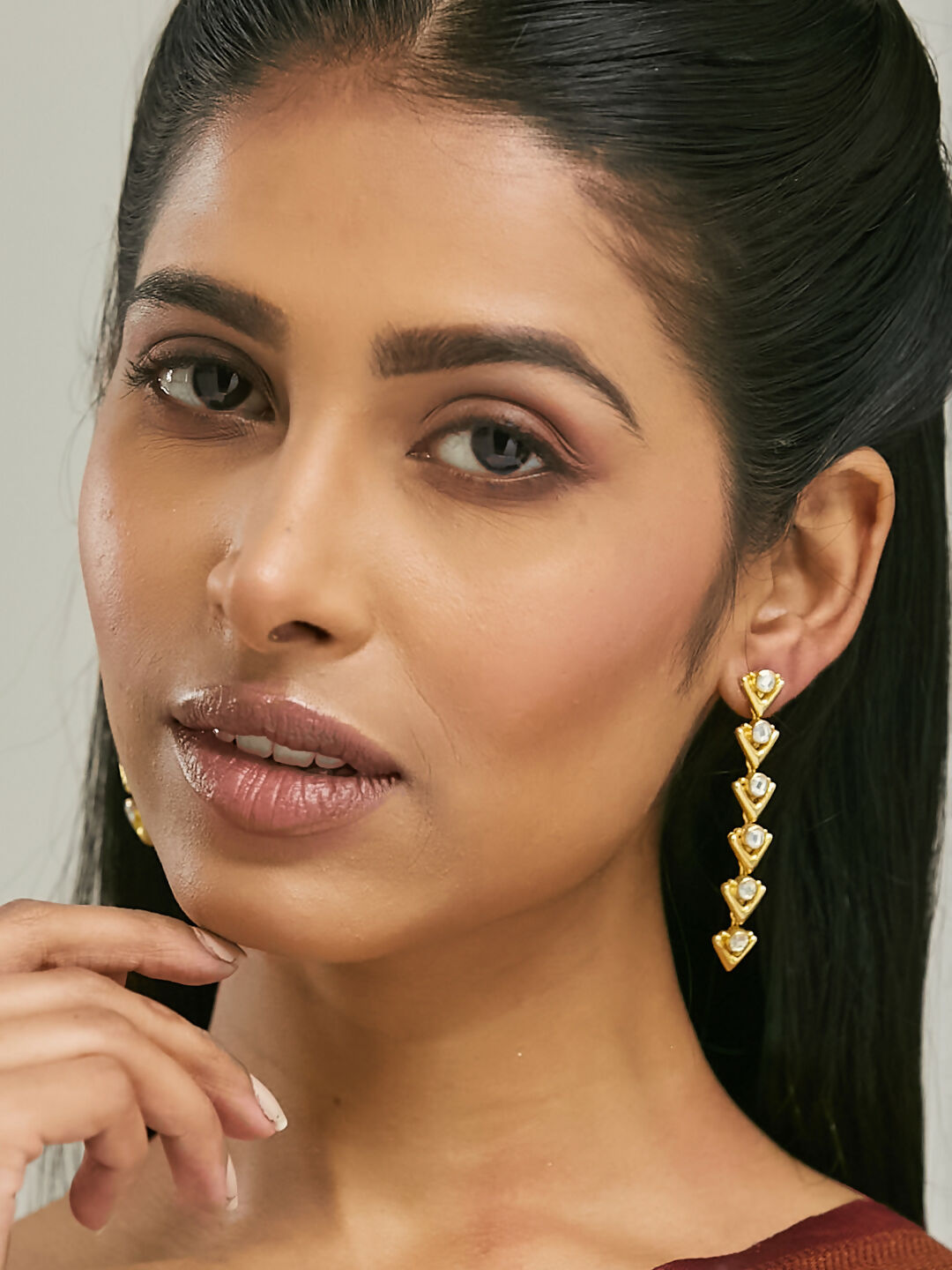 Nuyug 18K Gold-Plated Crystal Stone Studded Triangular Drop Sleek Earrings | Swadesiicart