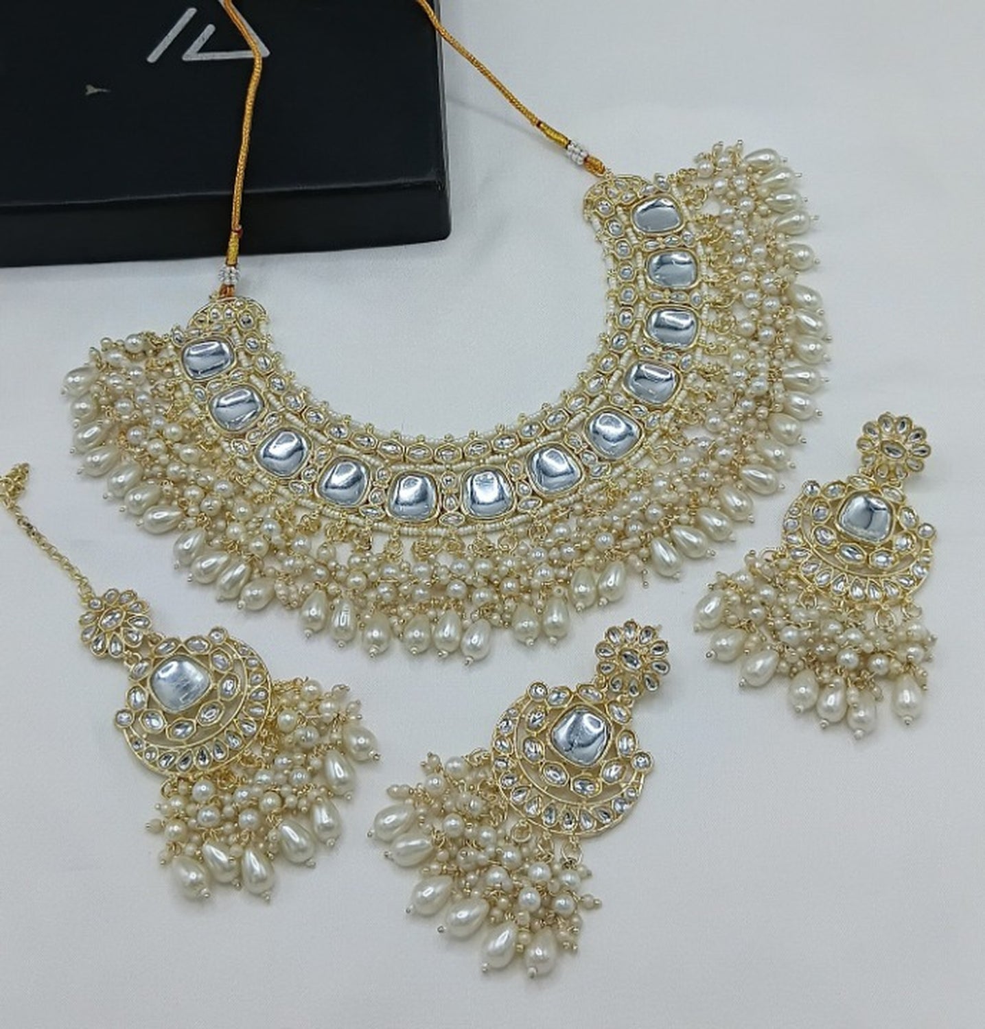 Jewel City Luxurious Kundan Choker Set with Pearl and White Bead Accents - Traditional Indian Bridal Jewelry | Swadesiicart