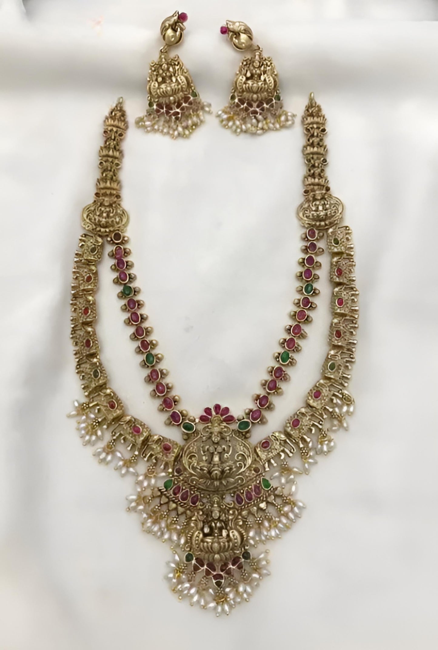 Jewel City Exquisite Gold-Plated Bridal Necklace and Earrings Set with Ruby and Emerald Accents | Swadesiicart