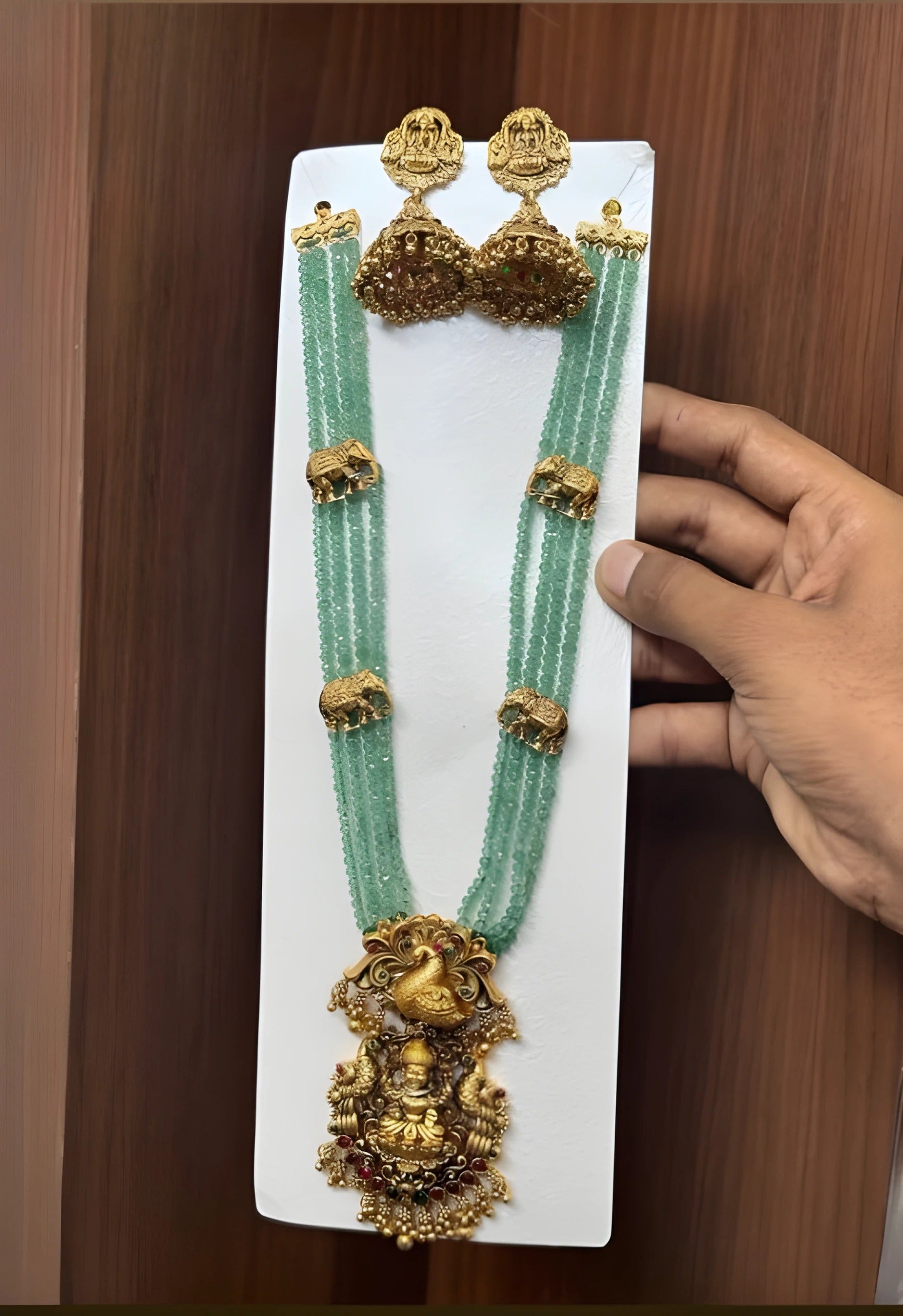 Jewel City Luxurious Emerald Green Temple Goddess Kundan Jewelry Set - Handcrafted Gold-Plated Bridal Necklace with Jhumka Earrings | Swadesiicart