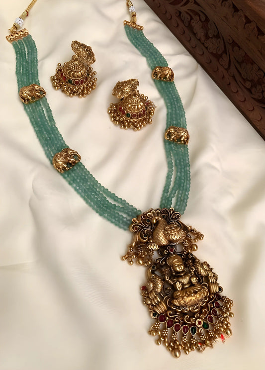 Jewel City Luxurious Emerald Green Temple Goddess Kundan Jewelry Set - Handcrafted Gold-Plated Bridal Necklace with Jhumka Earrings | Swadesiicart