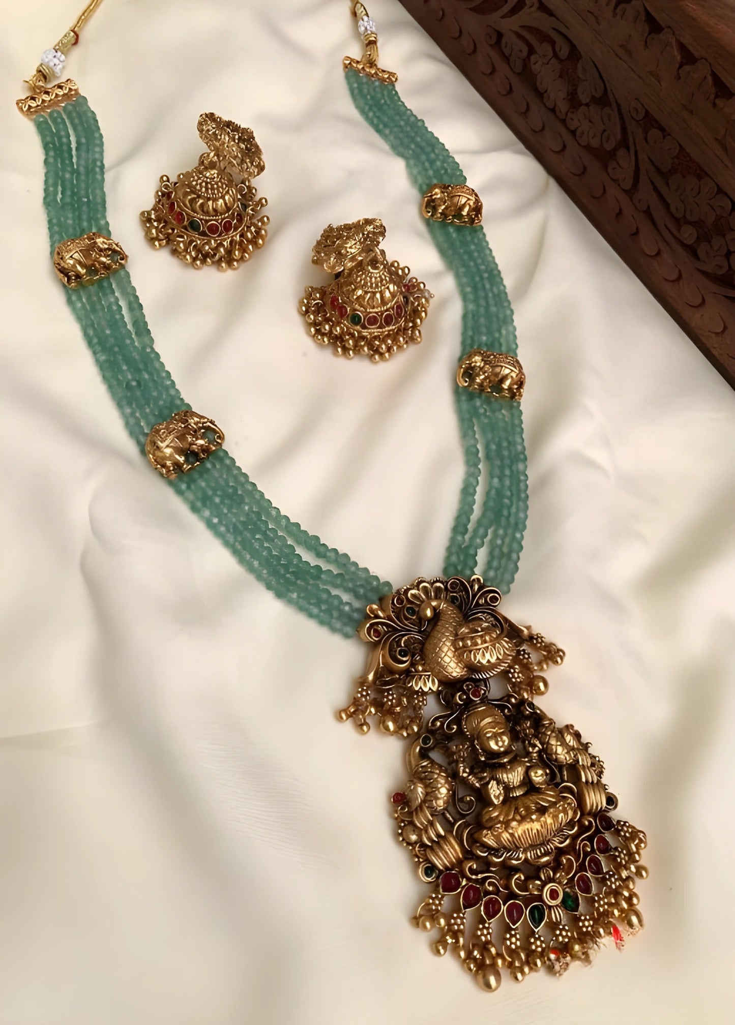 Jewel City Luxurious Emerald Green Temple Goddess Kundan Jewelry Set - Handcrafted Gold-Plated Bridal Necklace with Jhumka Earrings | Swadesiicart