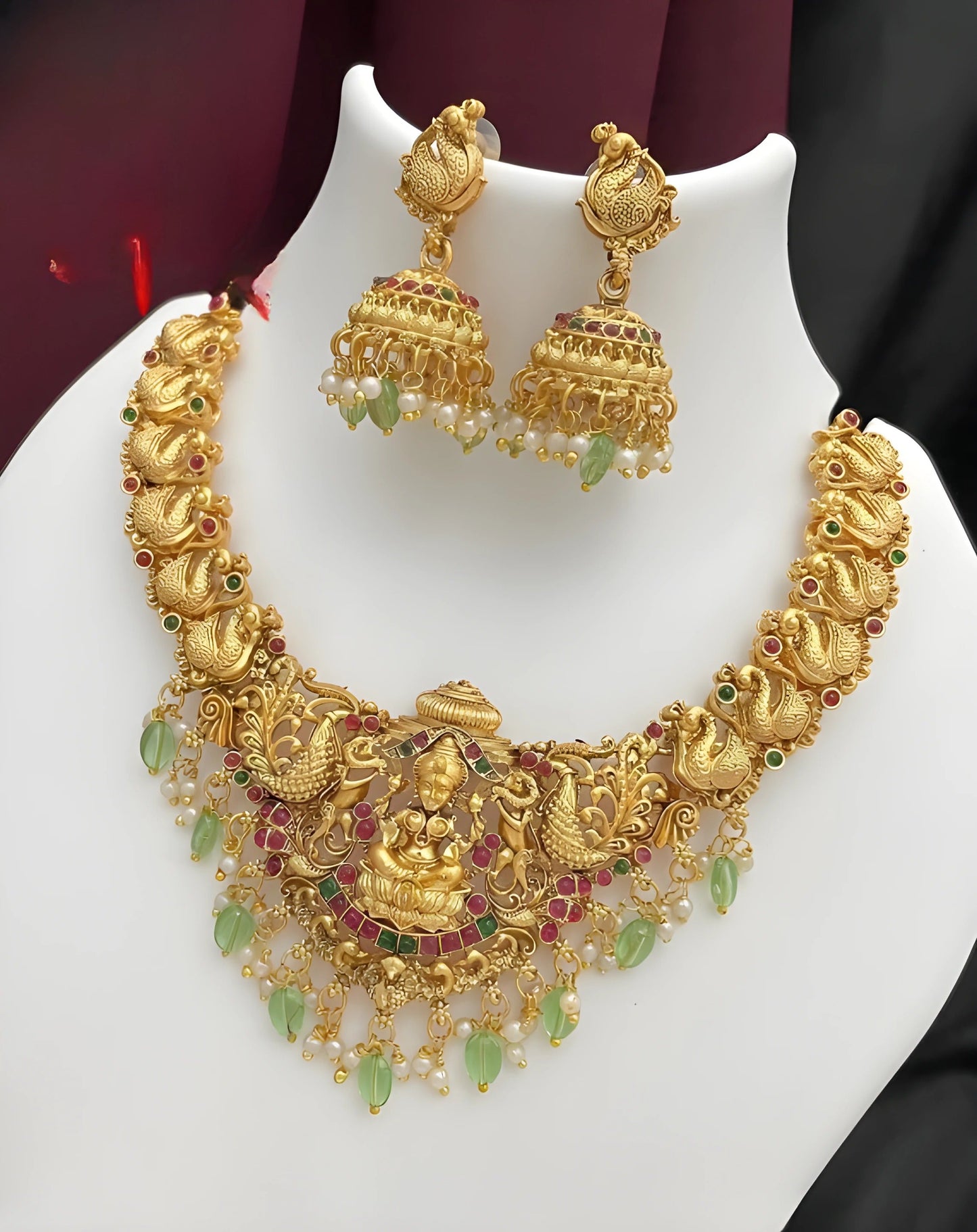 Jewel City Opulent Gold Peacock Lakshmi Temple Necklace Set - Handcrafted Antique Finish Bridal Jewelry with Emerald & Pearl Accent | Swadesiicart