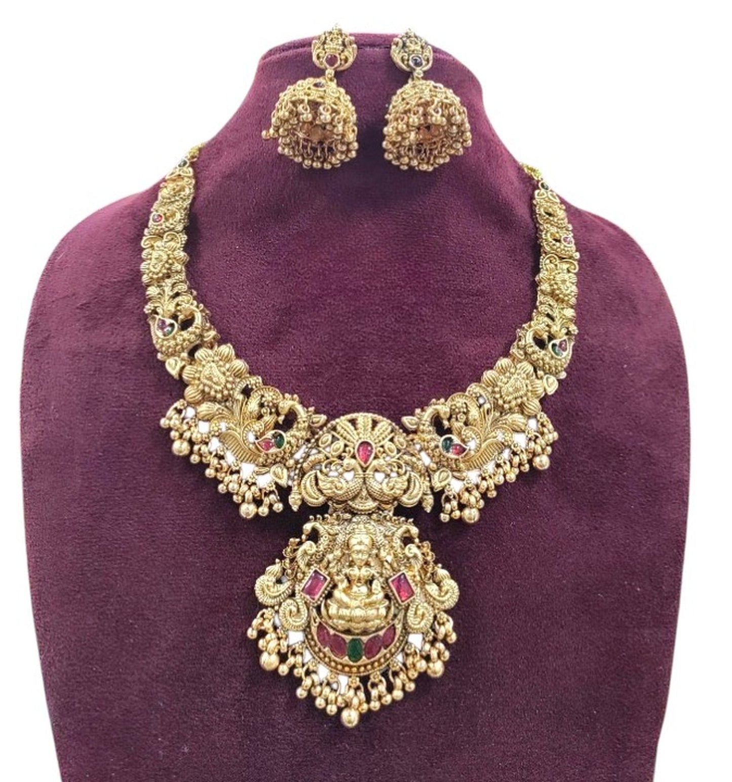 Jewel City Gold Lakshmi Temple Necklace Set - Bridal Jewelry with Ruby and Emerald Accents | Swadesiicart